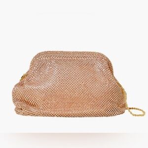 Loeffler Randall Doris mini clutch in rose gold.